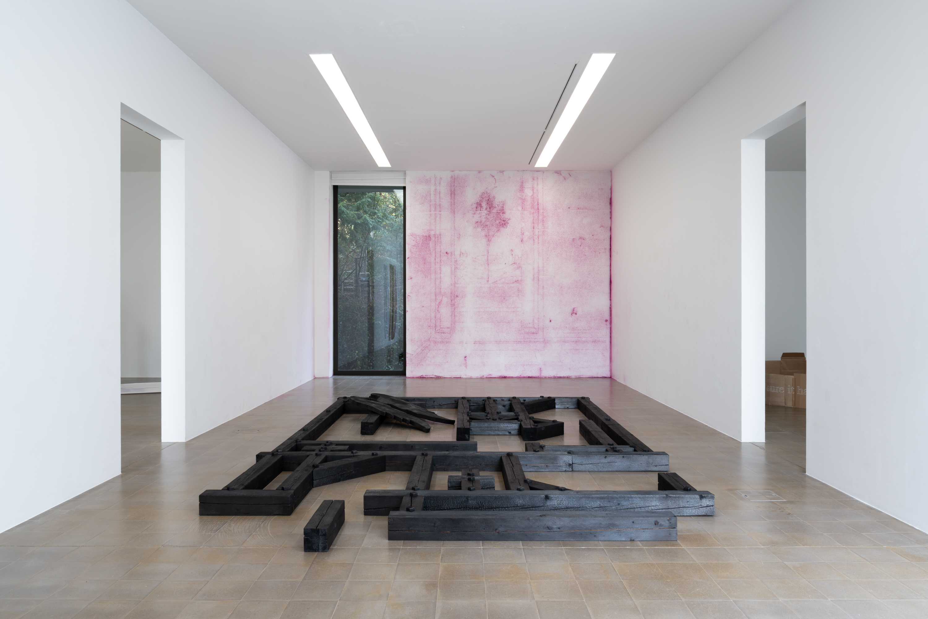 Luzi Paulin Simeon, *Lifelover*, 2026. Burnt wood, 20 × 550 × 370 cm. Photo: Finn Curry.